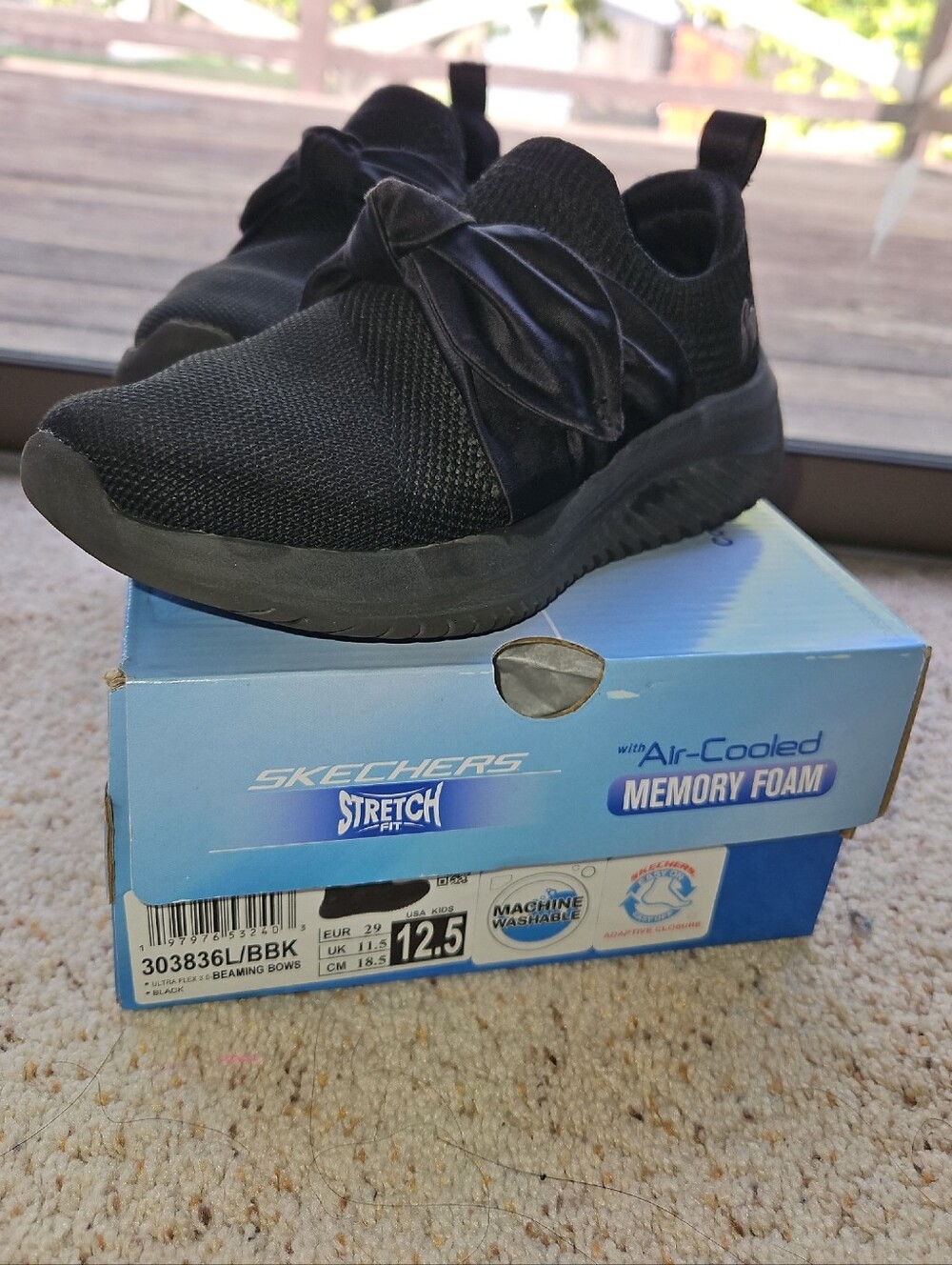 Skechers Kids Black Slip-On Knit Sneakers with Bow